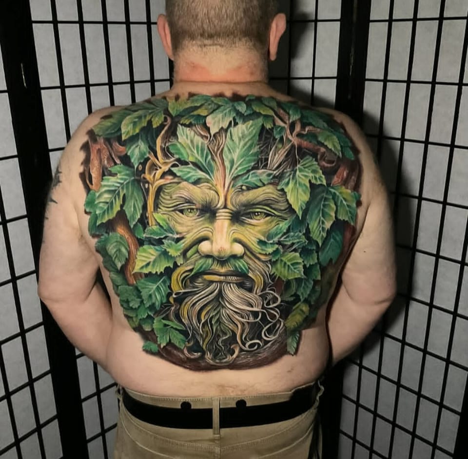 Green Man back piece with leaves and wood grain by Sikes