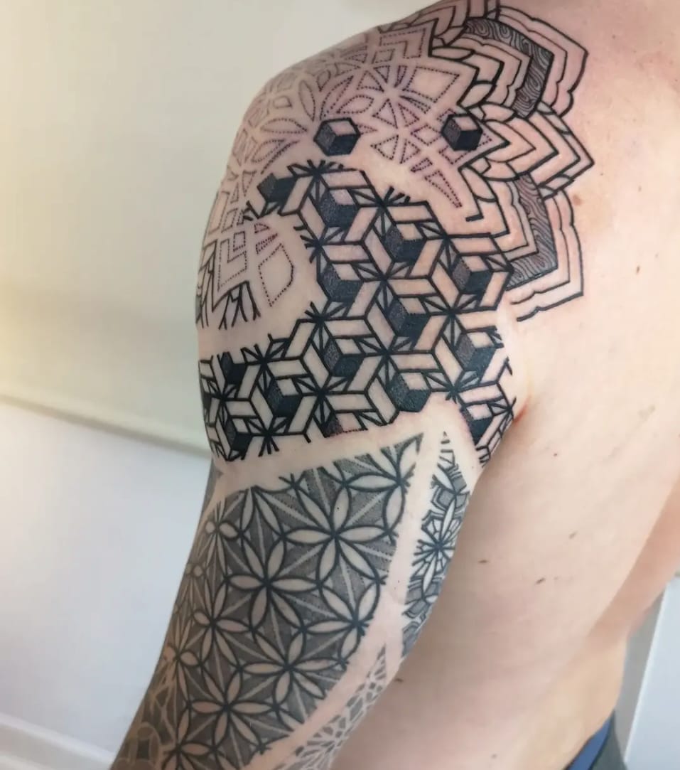 Geometric pattern blackwork shoulder and sleeve by Chris