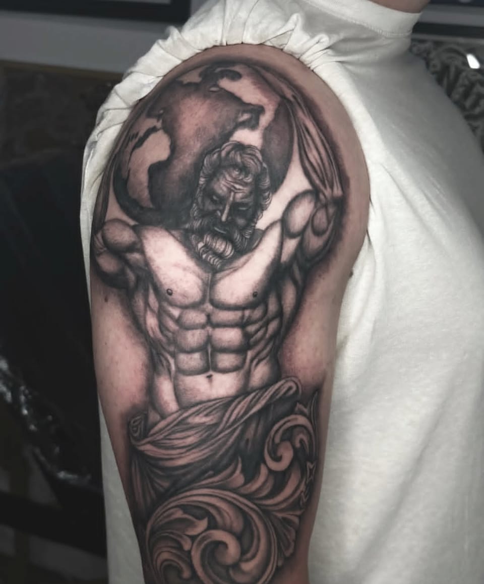 Black and grey Atlas holding the world shoulder piece by Liam